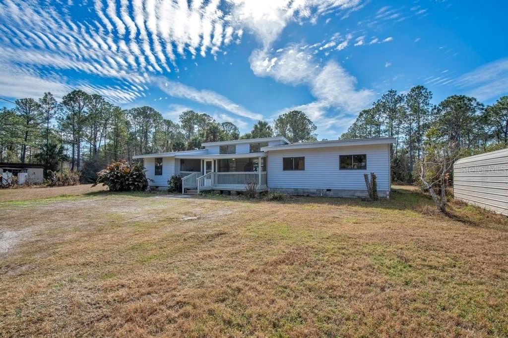 Photo of 425 Scooter Point, Geneva, FL 32732 (MLS # O6379072)