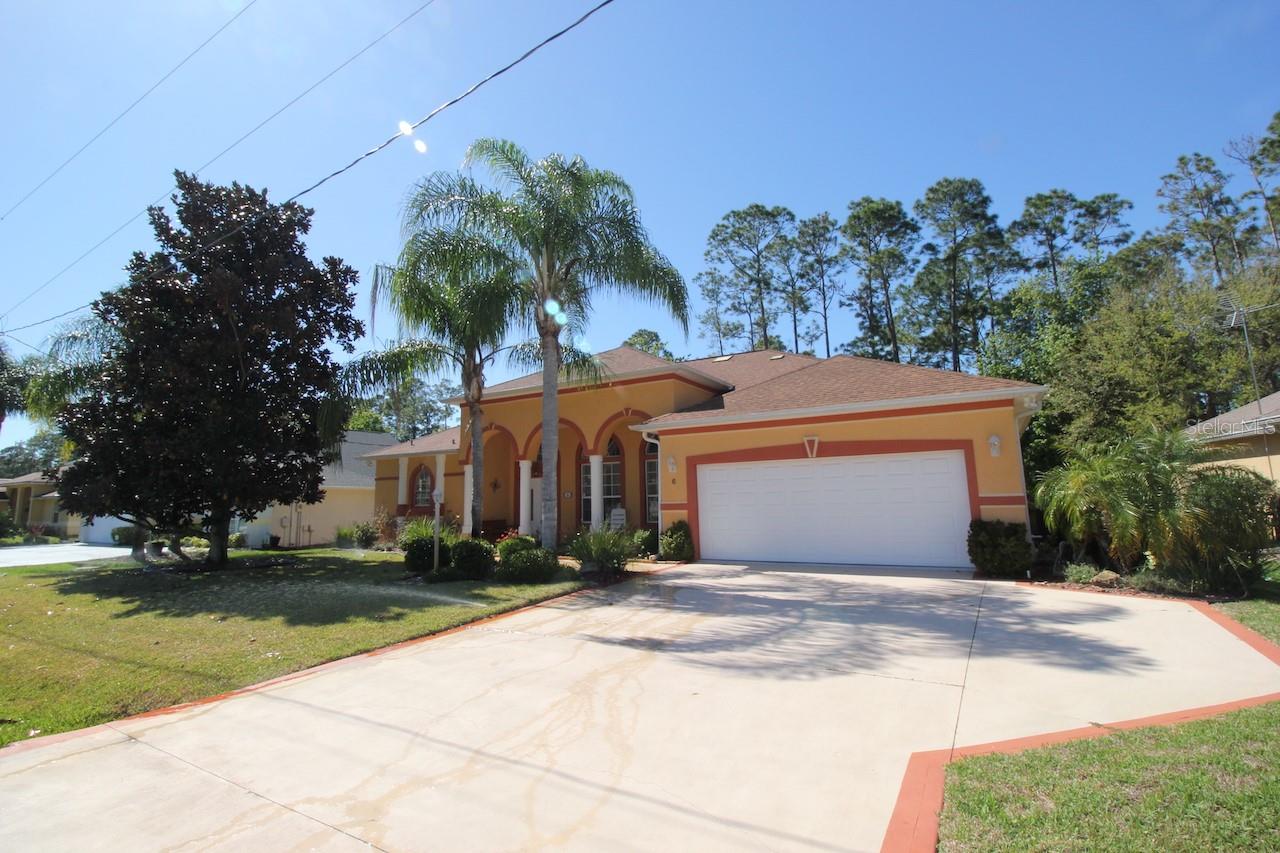 Spacious 3 Bed 3 Bath Partially Furnished POOL HOME with 2 Car Garage backing up to Cypress Knoll Golf Course in the E section of Palm Coast. Enter the gorgeous double door entry and be immediately impressed with the volume ceiling height, crown molding, rounded corner drywall, coordinating tile and carpeting and many architectural elements such as designed windows, decorative columns and tray ceilings. A wonderfully though out floor plan and abundant natural light makes this home an entertainers dream with both formal and informal areas, a large screened lanai that includes full outdoor bathroom and a generously sized backyard. A large kitchen with nice countertops, custom cabinetry with a large walk in pantry. Split floor plan and many more upgrades. Excellent location situates this home close to shopping, entertainment, restaurants, parks, town center, and everything Palm Coast offers. Easy access to the local beaches via main roadways. Speedy commute to both Daytona and Jacksonville via I95. PARTIALLY FURNISHED, LAWN CARE & POOL CARE Included in Rent! Apply Today LBTR#13922