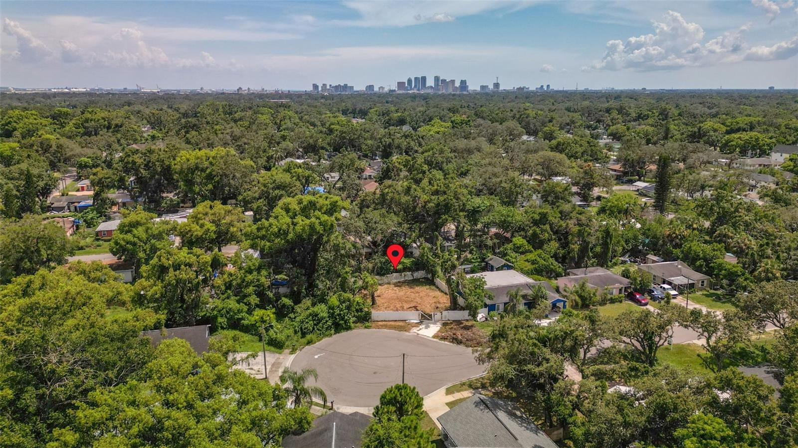 Welcome to an incredible opportunity to design and build your ideal home on this oversized cul-de-sac lot in the heart of Southeast Seminole Heights. Whether you’re dreaming of a modern bungalow with a wraparound porch, a garden sanctuary with a pool, or a multi-generational layout with room to grow—this spacious lot gives you the flexibility to make it happen.
Tucked into a charming pocket of Tampa that blends historic character with modern flair, Southeast Seminole Heights is one of the city's most sought-after neighborhoods for a reason. Just a few blocks away, you’ll find beloved local favorites like Duff's, Southern Brewing & Winemaking, Olde Heights Bistro, King of the Coop, and Hair of the Dog Park & Bar—where neighbors gather, pups play, and community thrives.
Enjoy quick access to I-275, downtown Tampa, Ybor City, and Armature Works, making your daily commute and weekend adventures effortless. You’re also just minutes from the Hillsborough River, Giddens Park, and some of the best local markets, breweries, and eateries Tampa has to offer.
Whether you’re an investor, a future homeowner, or a custom builder, this rare oversized lot offers endless potential and the chance to be part of the growth and revitalization of a historic neighborhood that still holds onto its soul.
Bring your architect, your builder, and your dreams—this is your canvas.
