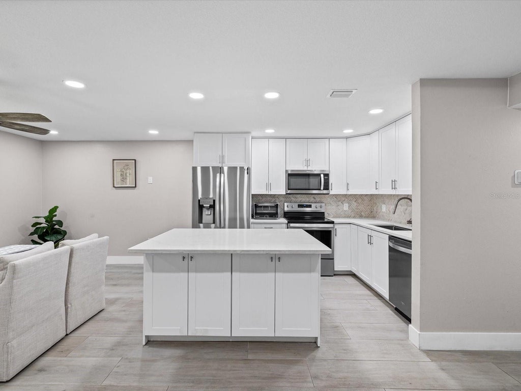 Photo of 4335 Aegean Drive #128A, Tampa, FL 33611 (MLS # TB8534070)