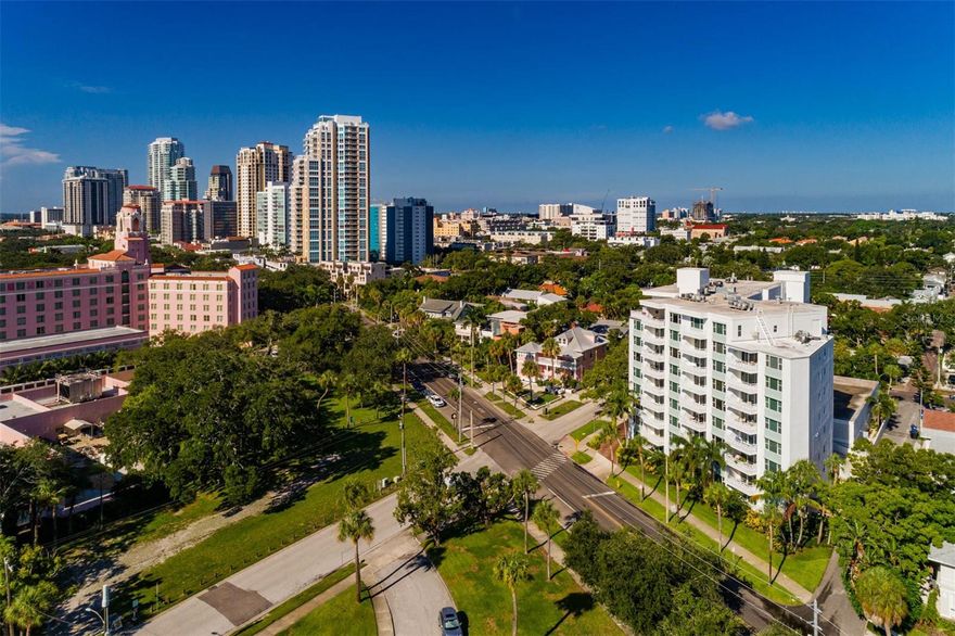 Nestled just two blocks from the lively heart of downtown St. Petersburg, the Harbour Hill exemplifies a harmonious blend of modern living and urban convenience. This distinctive property, renowned for its beautifully renovated 1-1, 1020 sq ft. sought after floor plan, offers a lifestyle enriched by both comfort and contemporary design with its meticulous attention to detail, exceptional amenities, and prime location. The downtown area boasts from high-end dining experiences to energetic nightlife spots, all nestled beside picturesque waterfront parks. The eclectic mix of theaters, museums, shops enriches the local tapestry. For the active lifestyle enthusiast, access to an extensive network of walking and biking paths, tennis courts, and pools. The convenience of professional sports teams, such as the Tampa Bay Rays, Rowdies, and Buccaneers, provides more options. The residence within Harbour Hill is a remarkable showcase of innovative design and functionality. The renovation has been executed with precision, transforming its interior into a luminous space that celebrates contemporary aesthetics while acknowledging the charm of its surroundings. The open floor plan maximizes natural light and invites a sense of warmth and openness that resonates the view of the historic Vinoy Hotel. In terms of design, the kitchen stands out as a focal point, tailored for those who appreciate culinary arts. Equipped with high-end European appliances and custom cabinetry, it not only serves as a functional space for cooking but also as a social hub thanks to the inclusion of a custom wood island and a bar that overlooks the dining area. The bedroom, with ample space easily accommodates additional furnishings, creating an inviting retreat for relaxation or remote work. The integration of a thoughtfully designed custom closet complete with washer and dryer exemplifies the balance between practicality and aesthetics. The bathroom complements the unit’s modern appeal, featuring a walk-in shower and contemporary vanity. The renovated community room and rooftop deck provide invaluable spaces for social interactions, revealing stunning views of the city skyline and surrounding waterfront parks. Additional conveniences such as assigned garage spaces, designated storage rooms, a library and mailroom—further enhance the daily lives of residents. The presence of a secure building, garage parking and X flood zone assures residents of their safety and well-being, In essence, Harbour Hill represents an exceptional living environment characterized by its strategic location, thoughtful design, and array of amenities designed for a lifestyle steeped in vibrancy. The ability to enjoy modern renovations while being enveloped by the charming character of St. Petersburg positions this condominium as a highly sought-after residence for individuals aged 55+. Through Harbour Hill, one can embrace a lifestyle where comfort, modernity, and community converge seamlessly. Wall unit in the living room conveys.