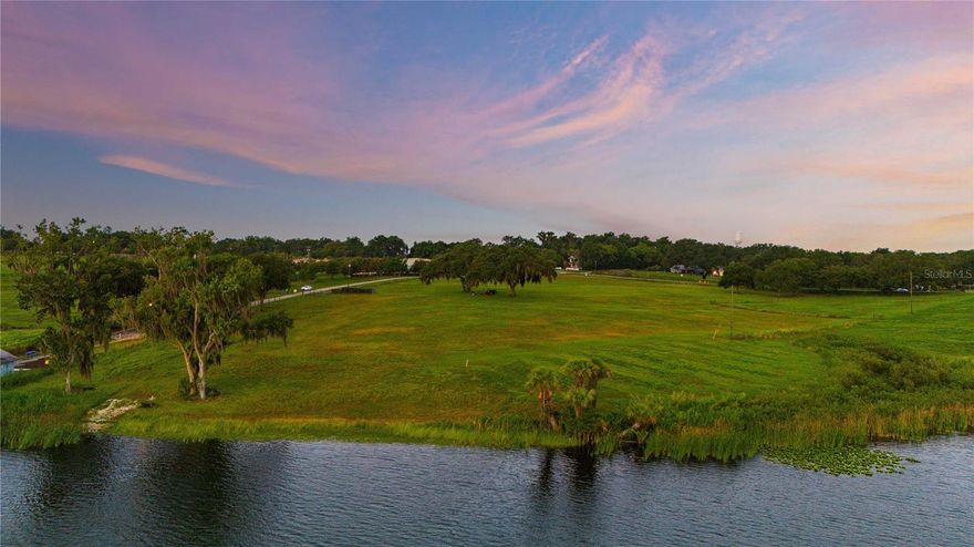 Discover your dream escape with this extraordinary 12+ acre San Ann lakefront property, offering unparalleled beauty and endless possibilities. Nestled along the serene shores of Lake Jovita, these unique parcels combines natural splendor with exceptional potential for development or a private retreat. Enjoy direct lake access perfect for swimming, boating, and fishing. The property boast over 200 feet of lake front, ensuring breathtaking views and privacy. Ideal for creating a private estate, multiple residences, or a recreational haven. The property’s elevated positions provide spectacular sunrise and sunset views, making every moment a picturesque experience. Located within easy reach of major highways and nearby towns, this property offers the perfect balance of seclusion and accessibility. Enjoy the convenience of local amenities, shopping, dining, and more. Don’t let this beautiful lake front property pass you by.