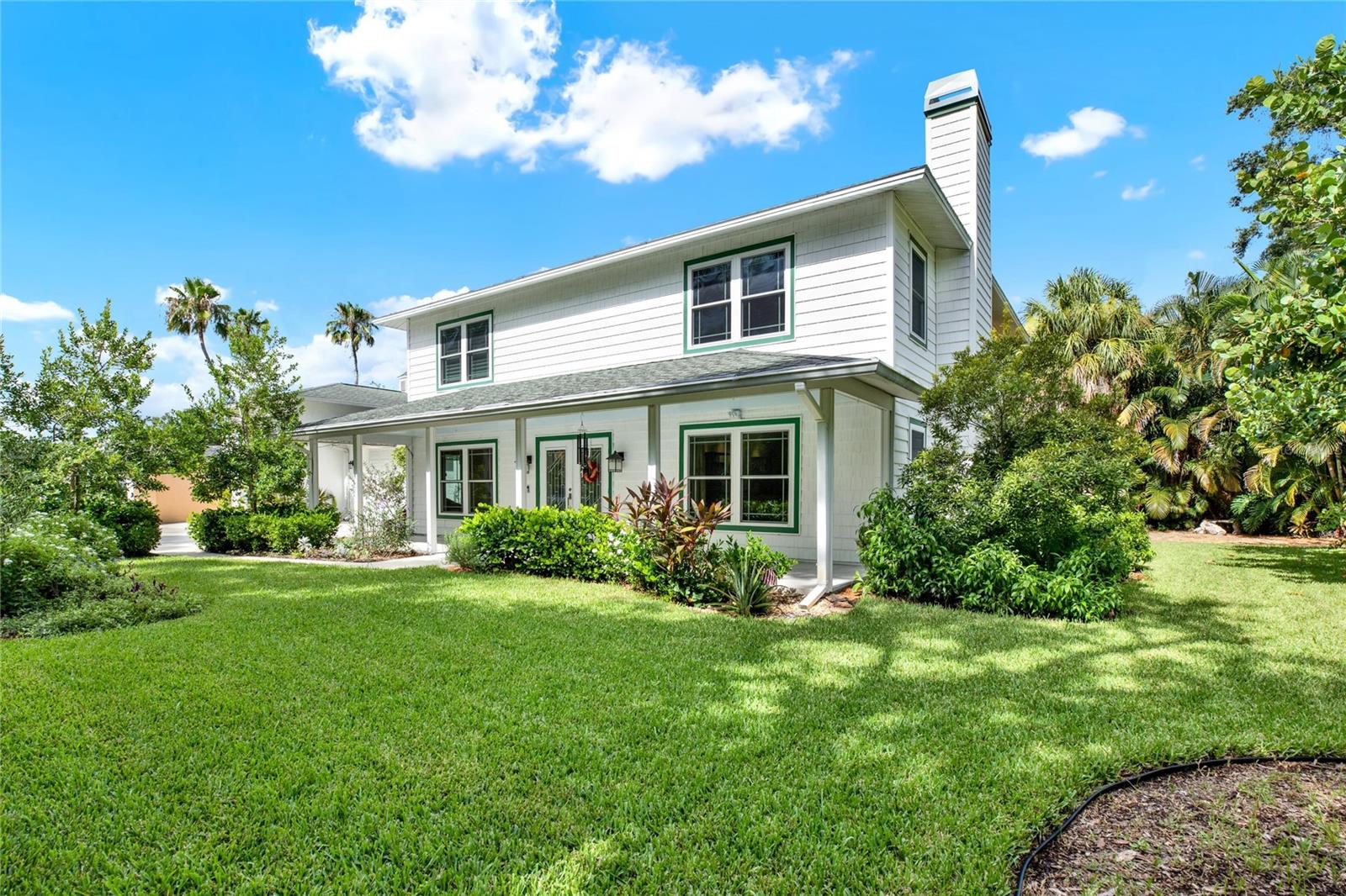 DON’T MISS THIS RARE OPPORTUNITY TO OWN A STUNNING BELLEAIR ESTATE-STYLE HOME IN DESIRABLE WILDWOOD PARK! This meticulously maintained and beautifully updated 3BR/2.5BA home with ATTACHED OVERSIZED RV/BOAT GARAGE is move-in ready. Enjoy timeless curb appeal with an inviting front porch and double door entry. Inside, you'll find hardwood floors, crown molding, and recessed lighting throughout. The spacious chef’s kitchen features a large island, double convection ovens, gas cooktop with pot filler, warming drawer, granite countertops, under-cabinet lighting, and abundant cabinetry. Enjoy casual meals in the adjacent breakfast nook or at the convenient bar seating. The formal living/dining area boasts a wet bar and cozy wood-burning fireplace. A versatile bonus room offers endless possibilities—perfect for an office, gym, playroom, or extra storage. Step outside to the expansive screened porch overlooking the beautifully landscaped backyard with new sod and well-fed irrigation system—ideal for relaxing or entertaining. Upstairs, the oversized primary suite includes a large vanity, in-suite laundry, WALK-IN CLOSET, and built-in drawers. Both secondary bedrooms have walk-in closets; one has direct access to the full hall bath. Additional features include HURRICANE IMPACT WINDOWS, 2 NEW HVAC SYSTEMS with 10-year transferable warranty, security system with cameras & motion detectors, central vac system, water softener, generator hook-up with transfer switch, blown-in attic insulation & solar fans, and more! The attached 2-car garage is complemented by an RV/BOAT GARAGE WITH 14’ CEILINGS, 300 amp service, and wall-mounted A/C. Located in a NON-FLOOD ZONE WITH NO STORM DAMAGE, this home is just minutes from Belleair Country Club, Gulf Beaches, parks, Pinellas Trail, shopping, and dining. Schedule your private showing today!