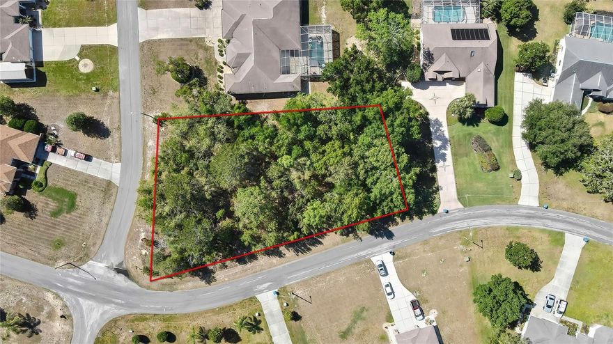 Imagine building your dream home on this expansive corner lot in the peaceful Amidon Woods of Spring Hill! Spanning a generous 0.61 acres, this property offers you the space you've been looking for in a tranquil setting. Enjoy the convenience of being just moments away from local amenities, a variety of shopping options, and delicious dining experiences. Plus, adventure awaits with quick access to The Suncoast Parkway, the enchanting Weeki Wachee River, the beautiful Pine Island, and Tampa General Hospital Spring Hill. Best of all, there are NO HOA fees! This is your opportunity to create the Florida lifestyle you've always envisioned.