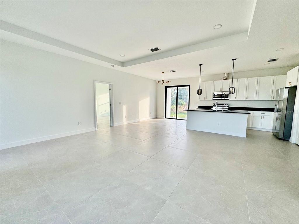 Photo of 13435 Bouvardia Lane, Port Charlotte, FL 33981 (MLS # C7518101)