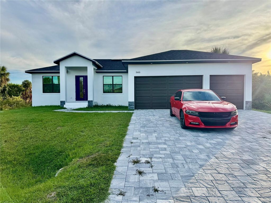 Photo of 13435 Bouvardia Lane, Port Charlotte, FL 33981 (MLS # C7518101)