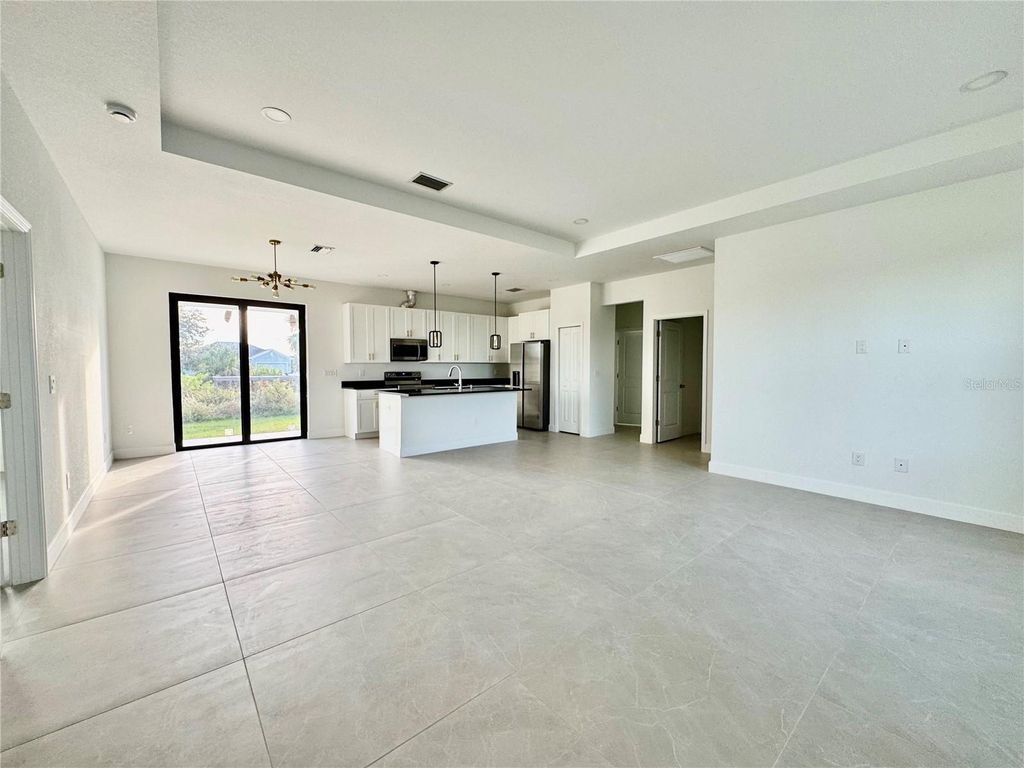 Photo of 13435 Bouvardia Lane, Port Charlotte, FL 33981 (MLS # C7518101)