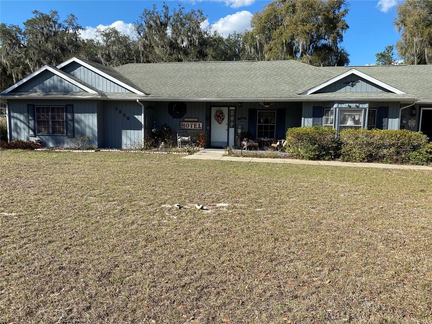 Come out and see this well kept 3 bedroom 2 bath home in a great fishing community!  This home has very spacious rooms.  There is a 2 car garage with a screen door for your outdoor enjoyment.  The irrigation was just updated in 2025 with a new well but also has city water.  The A/C was updated in 2025.  The home sits on a beautiful oversized lot.  There is a beautiful screened in back porch and a lovely covered front porch for more outdoor enjoyment.  The shed in the back yard can hold all of your tools.  Lake Panasoffkee is a natural spring fed lake and is famous for it's bass fishing along with with many other species.  It is also great for canoeing, kayaking and boating.  You can get to The Villages quickly for lots of entertainment, dining and shopping.  The turnpike is close by.  Orlando is only an hour away!