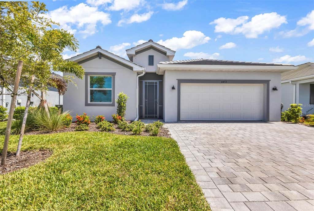 Photo of 8472 Shore Lake Drive, Englewood, FL 34224 (MLS # C7529315)