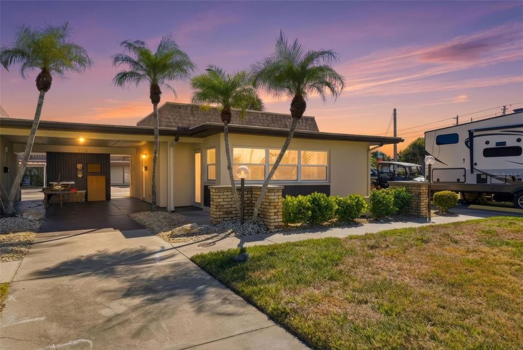 Photo of 5153 Turquoise Lane #102, New Port Richey, FL 34652 (MLS # TB8472375)