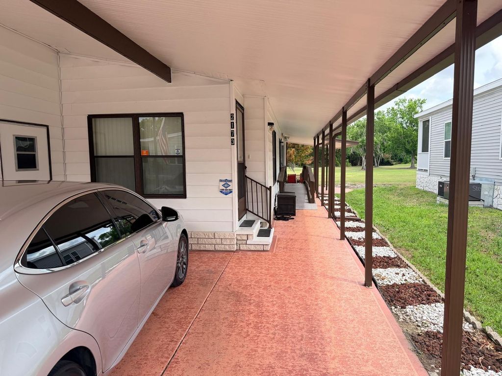 Photo of 2173 Pebble Beach Boulevard, Orlando, FL 32826 (MLS # O6396809)