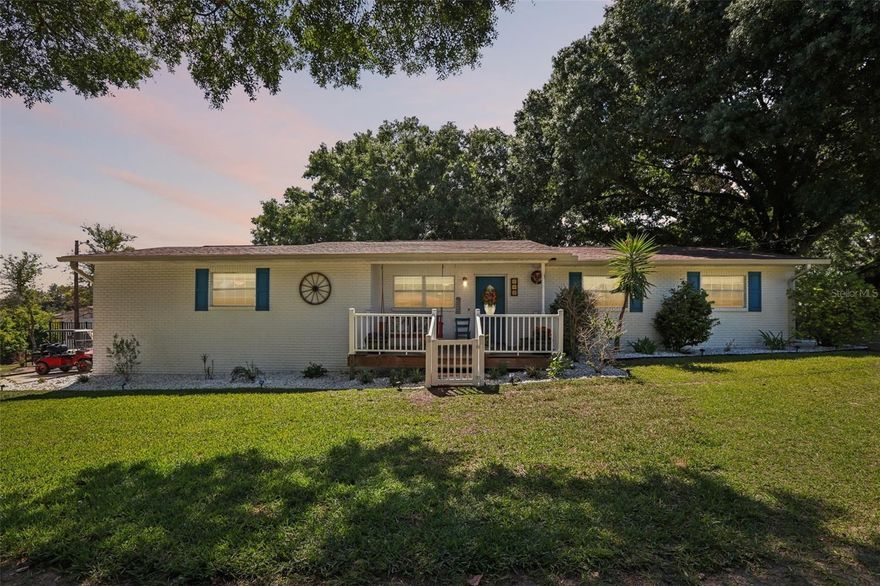 Quiet country living meets modern updates on nearly 2.5 acres in North Lakeland! This immaculately maintained 3-bedroom, 2-bath POOL home sits at the end of a dead-end street, offering privacy, space, and a truly serene setting.

The fully fenced main yard surrounds the home, while the remaining acreage features lush, natural forestry and a variety of fruit trees including peach, pear, apple, mulberry, banana, key lime, kumquat, and moringa. A gated driveway welcomes you in, with beautiful homes lining the approach.

Inside, the home is completely updated and move-in ready. The remodeled kitchen (2019) showcases granite countertops, a large butcher block island, and updated appliances (all included), opening seamlessly to the living and dining areas—perfect for entertaining. A spacious bonus den/flex space offers endless possibilities for a playroom, office, or hobby area.

The primary suite features an updated ensuite bath with custom finishes, including a rain-head shower and shiplap accents. Both bathrooms have been upgraded with new vanities and cultured marble tops, and tile flooring has been refreshed throughout.

Step outside to enjoy the private pool, front and back porches, and a peaceful outdoor setting ideal for relaxing or hosting. Additional features include a detached garage/workshop with electric (912 sq ft total), a large chicken coop (with optional chickens), and even a backyard playset that conveys.

Major updates include roof (2020), HVAC (2019), ductwork updates, well pump (2017), pool pump (2021), and exterior paint/siding (2020)—giving peace of mind for years to come.

Conveniently located just minutes from shopping, dining, and everyday essentials, this property offers the perfect blend of privacy, acreage, and accessibility.

Don’t miss your chance to own this unique North Lakeland retreat—schedule your showing today!