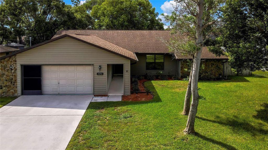 Photo of 3296 Dolin Avenue, Spring Hill, FL 34606 (MLS # W7877281)