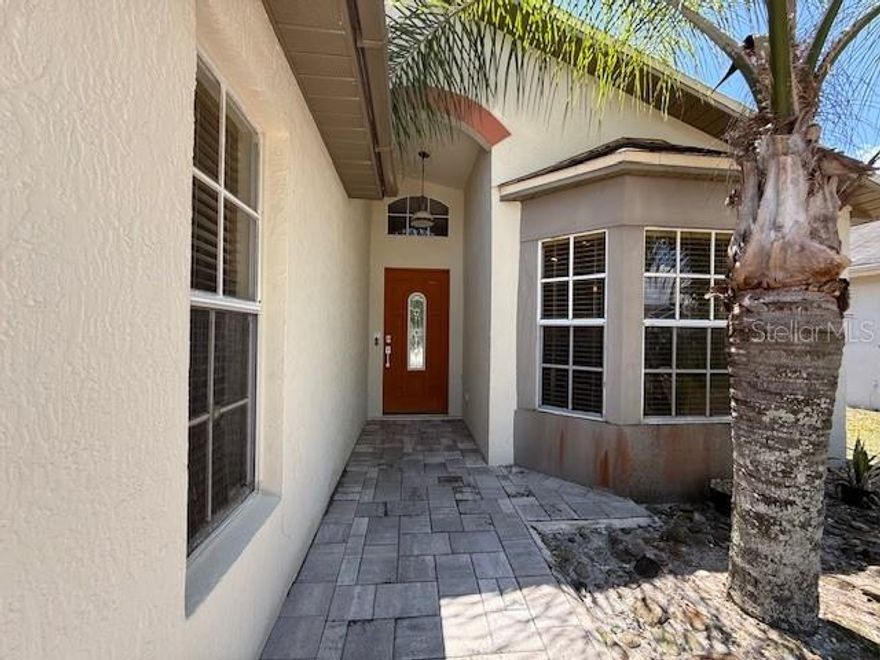 *POOL HOME* GREAT PRICE* No Flood Zone* Located in Winding Creek HOA community. Renovated 3bdrm 2 bath Pool home located 15min to Downtown, 5Min to Waterford Lakes Town center, no back neighbor only serenely wooded. **Master bathroom is the last room to finish-it has everything already needed for the final completion. (tile,vanity,bowl sink, (EVERYTHING IS THERE) As you enter this Renovated RESTORATION HARDWARE themed home you will be greeted by oversized BRICK PAVED DRIVEWAY, Gloss finished garage floor, TRAVERTINE FLOORING & NATURAL STONE ON ACCENT WALLS THROUGHOUT along with Matte textured walls, 86" TV in Living room can stay. This home is Perfect for entertaining with French doors from Living room and Master Bedroom leading you out to the covered & Screened-in pool area with a lovely waterfall emitting tranquil sounds. In the Spacious eat-in kitchen are NEW wood cabinets, granite counters, stainless appliances, a pantry, and eat-in area. Living room offers vaulted ceiling. 
Roof 2015, Private No Outlet neighborhood. close to everything yet tucked away.2min to S.R.408. *Room sizes are approximate buyer to measure**