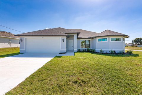 Photo of 710 NW 2nd Lane, Cape Coral, FL 33993 (MLS # TB8484924)