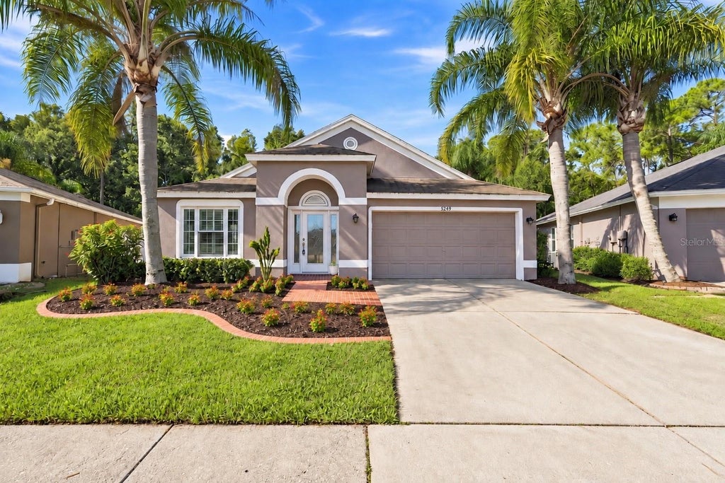 Photo of 5229 Algerine Place, Wesley Chapel, FL 33544 (MLS # TB8562836)