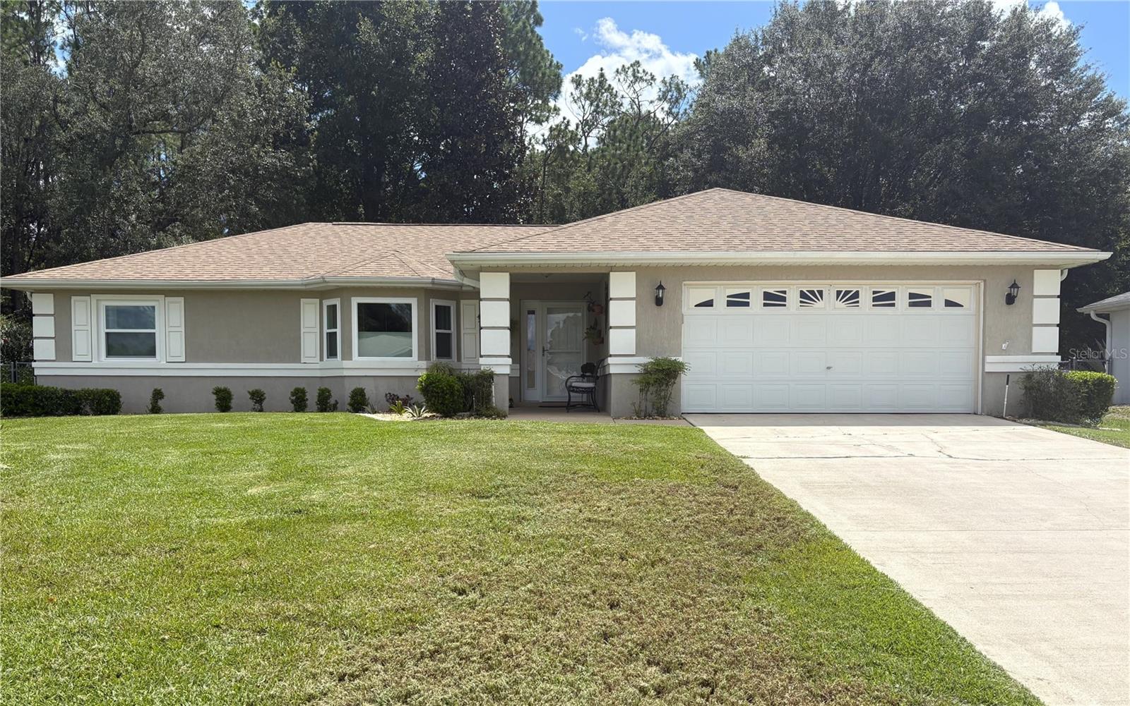 Look no further! This charming concrete block home checks all the boxes located in Cherrywood Estates, a
peaceful and quiet 55+ community in the heart of Ocala boasting over 1700sf of living space on an oversized
lot. Home has been meticulously maintained, it features a split bedroom floor plan with crown moldings, and
newly updated windows throughout the home with custom made blinds, a spacious kitchen with breakfast bar,
and eat-in space. All appliances including washer and dryer convey. The primary bedroom offers a good size
walk-in closet and a private en-suite bath with newly updated shower. Enjoy the enclosed lanai overlooking
the beautifully landscaped backyard with shaded trees and plants, the perfect sanctuary to relax and enjoy
nature. The roof was replaced in 2021 and the 3 Ton, 14 SEER Condensing unit by Frigidaire replaced in
2017. This home has been well kept. Just bring your personal items and you are good to go. MAKE THIS
HOME YOUR FIRST STOP! You won't be disappointed!!!
