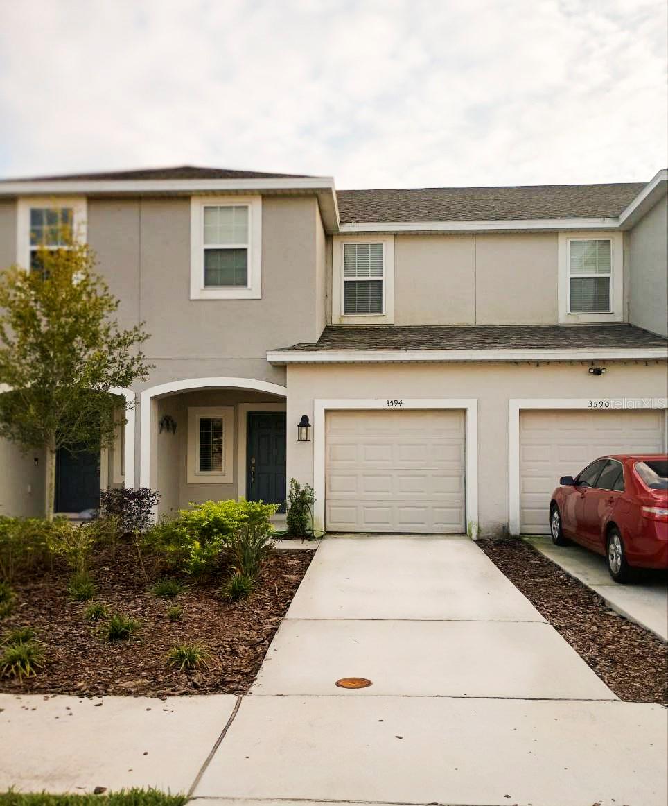 Experience modern comfort and convenience in this stunning 3-bedroom, 2.5-bathroom Jasmine townhouse at 3594 Davenport Creek Ct, Kissimmee, FL. Boasting 1,373 sq ft of thoughtfully designed living space, this home features a bright open-concept living and dining area, a modern kitchen with center island and quartz countertops, and a spacious primary suite with en-suite bathroom and large closet. Enjoy the private backyard patio, interior laundry, and ample storage including an attic and multiple closets. Residents benefit from a community swimming pool, maintained green spaces, and sidewalks, all managed by the HOA. Energy-efficient features include central HVAC, double-pane windows, and code-compliant insulation. Located near schools, shopping, parks, and major highways with easy access to Orlando and Disney World, this move-in ready townhouse offers the perfect combination of style, comfort, and convenience for your next home.