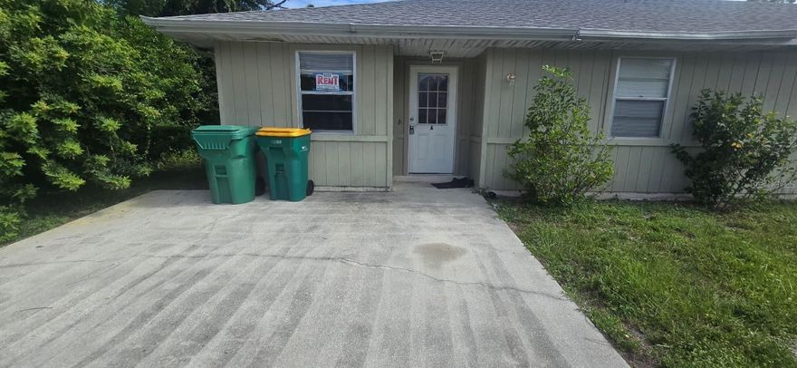 Now available — clean and spacious 2-bedroom, 2-bath Unit A in a quiet Port Charlotte duplex. This well-maintained unit features a split-bedroom layout, tile floors throughout, a bright open living and dining area, and a functional kitchen with plenty of cabinet space. Enjoy a private entrance and driveway parking. Conveniently located near shopping, restaurants, I-75, and local schools. Pets allowed with approval. First month’s rent, one security deposit ONLY. Available now — schedule your showing today!