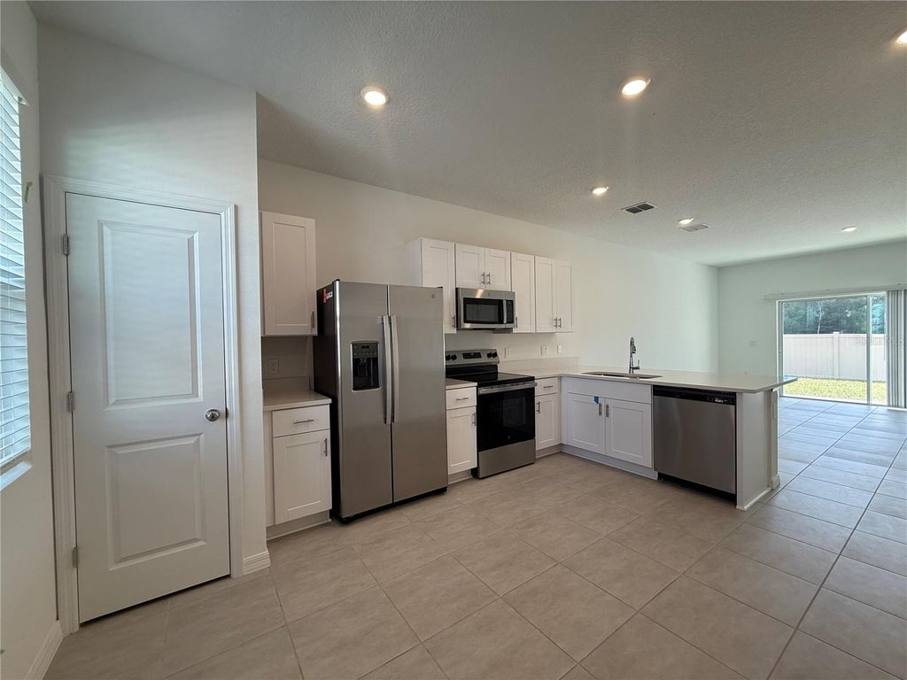 Photo of 3009 Skyline Loop, Kissimmee, FL 34758 (MLS # O6390292)