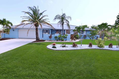 Photo of 107 Sinclair Street SE, Port Charlotte, FL 33952 (MLS # C7519800)