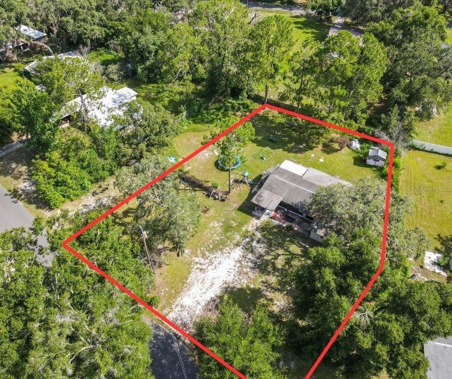 Discover the perfect canvas for your dream home or investment project with this spacious parcel boasting 28,649 sq ft in beautiful RidgeManor, FL. Nestled in a peaceful and growing community, this generous parcel offers endless potential - whether you're looking to build a custom home surrounded by nature or simply invest in Florida land. Enjoy the tranquility of a rural setting with convenient access to the Withlacoochee State Trail, Silver Lake Recreation Area, and I-75, making commuting to Tampa or Orlando a breeze. Nearby amenities include local shopping, dining, and charming downtown Dade City. Don’t miss out on this prime opportunity to own land in one of Hernando County’s most desirable and up-and-coming areas! Priced exclusively as land value.