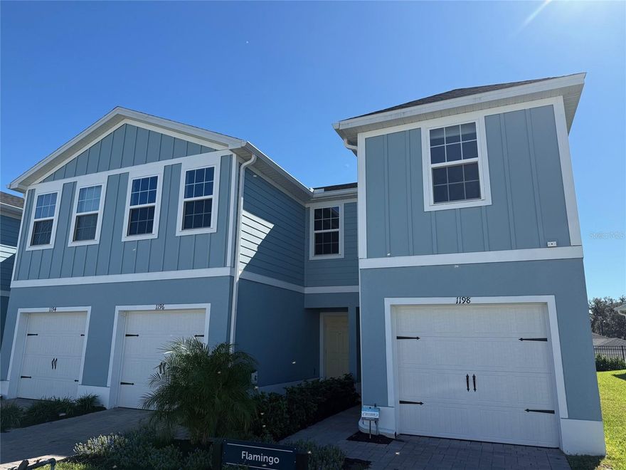 Welcome to Hammock  Oaks This 3/2/2 Flamingo was the former Model Home come and Enjoy your included exterior Maintenance and enjoy your new Life Style. This Ryan Flamingo Model is Two Level living, dining on First Level plus Three Bedrooms located on Second Level, Updated Kitchen with Quarts CTR Tops Ceramic Tile Flooring and Carpet in all Bedrooms. This New Ryan Community has it all Outside Play Area,, Community Mail station, Dog Park Large Community Center and Pool. Enyoy this Location Close to the new Walmart Neighborhood Center.close to Sumter Landing and Dining. Call to View the great Home