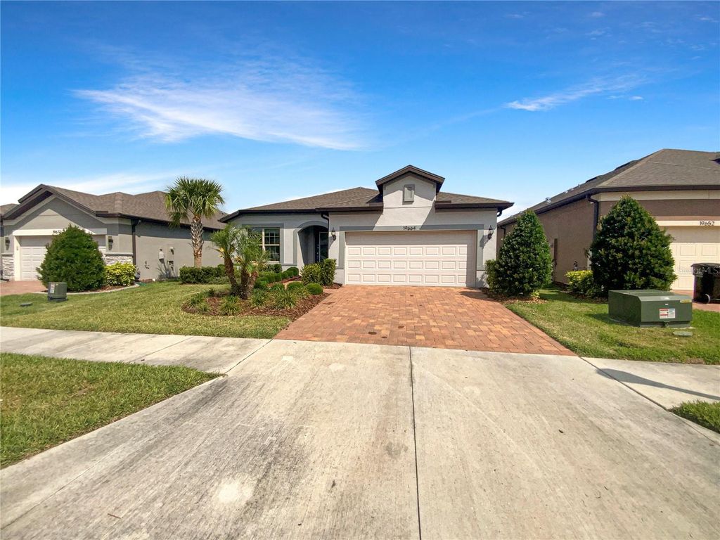 Photo of 19664 Ship Wheel Way, Land O Lakes, FL 34638 (MLS # TB8391674)