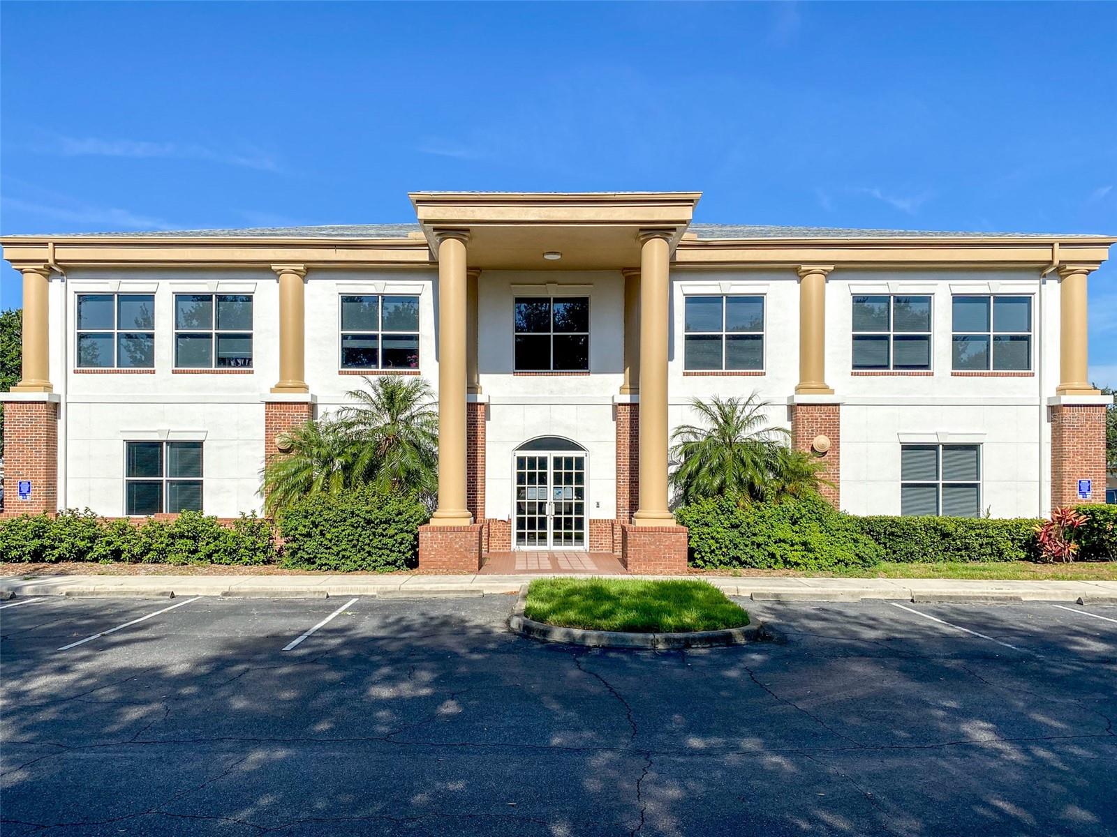 Braden River Business Center is a beautiful, well maintained, Income Producing multi-tenant office building available for purchase. Located on the high-traffic and high-visibility SR 64 corridor just west of I-75. Below market rents and CAM allow for increases over time making this a value-add opportunity. Part of a 8-building office complex with Owners Association that has replacement reserves for exterior maintenance and replacement.
This building is located in the front of the Braden River Office park, behind Culver's Restaurant and in front of other occupied office buildings. This business center overlooks a small lake with fountain, drawing attention from SR 64.
Being 27,000+ SF with six tenants, this two story office building has ample space for multi-tenant occupancy with reduced risk. With beautiful large columns in the front of the building, ample parking spaces, and well-maintained landscaping, this is a beautiful setting for any professional or medical office tenant.