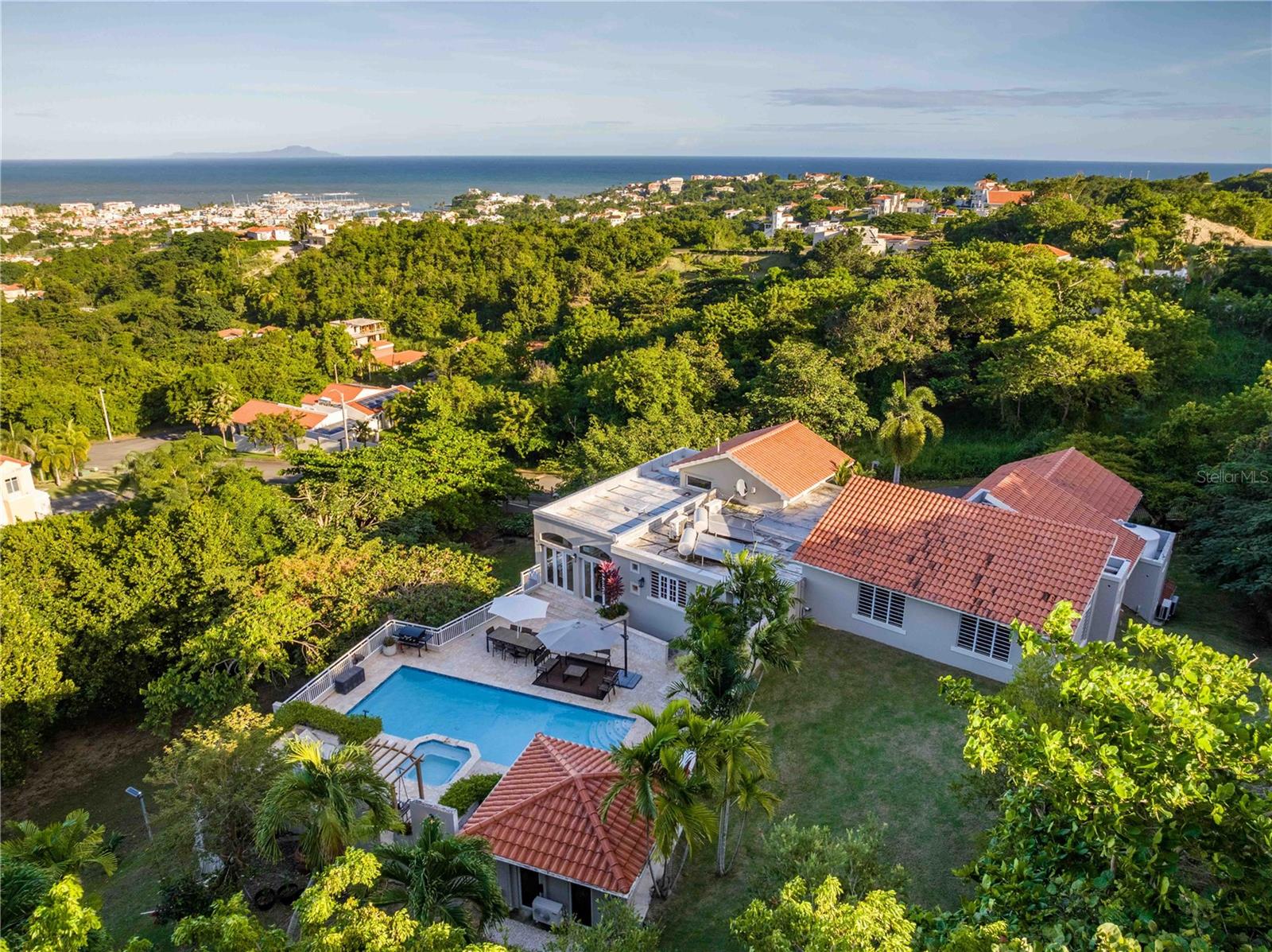 Luxury living at its finest in Harbour Lights Estates, Palmas del Mar, PR. This stunning turnkey estate spans approximately 4,500 sqft and has been meticulously maintained and upgraded to provide the ultimate in comfort and elegance. Seller Financing Available. Seller accepts CRYPTO as payment.
Property Features:
- 5 bedrooms, 4 full bathrooms, and 2 half bathrooms
- Remodeled kitchen with modern finishes
- Two sets of washers and dryers for added convenience
- Basement with private access and ensuite bathroom, ideal for guests or additional privacy
- Home gym and sauna for health and wellness
- Salt system pool for easy maintenance
- Dedicated gazebo office near the pool, perfect for remote work or creative projects
- Updated electrical systems throughout the home
- New solar water tanks for energy efficiency
- Full-home generator for seamless power backup
- Electric car charging station in the garage, suitable for both a car and golf cart
- New light fixtures throughout the home and a striking new front door
- Trimmed living room walls and freshly painted interior
The outdoor spaces are designed for relaxation and entertaining, with a beautifully designed pool area and ample space to enjoy the tropical surroundings.
Located in the exclusive Palmas del Mar community, this property is part of Puerto Rico’s premier resort community. Palmas del Mar offers over 25 neighborhoods, five miles of coastline, two miles of beaches, two golf courses, tennis and pickleball courts, an equestrian center, a world-class marina and yacht club, 16 restaurants, and resort-style amenities.
Asking Price: $3,849,000
HOA Palmas: $1,300/year
Harbour Lights HOA: $300/year
Schedule a private showing today to experience the luxury and lifestyle of this exceptional property.