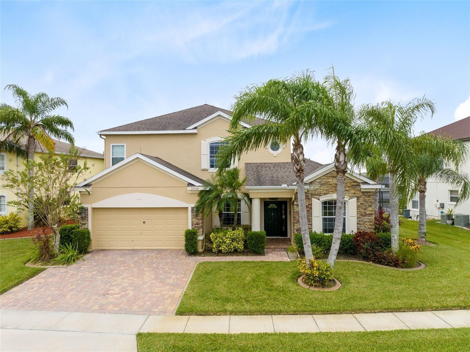 Professional Photos coming soon! Wonderful two-story water view home in The Oaks Golf Community, now offered for sale with tenants in place. This spacious home features high ceilings, abundant natural light, and scenic views from the screened-in pool and backyard. The layout includes an open kitchen and living room combination, a formal dining room, a separate family room, and an upstairs loft perfect for a home office or flex space. Located in a well-maintained golf community close to shopping, dining, recreational lakes, and major theme parks. Washer and dryer convey. Excellent opportunity for investors seeking a turnkey property with rental income in place.