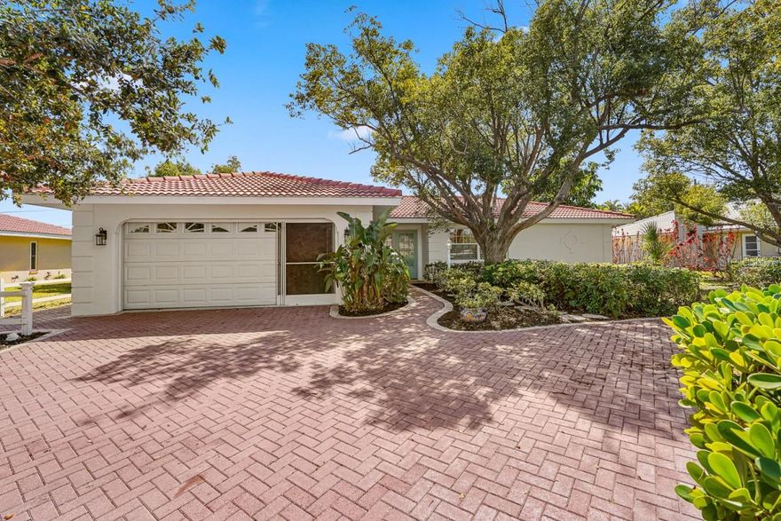 Step into the Florida charm you’ve been searching for in this beautifully updated 3-bedroom pool home in the desirable Sorrento East community. Flood Zone X and still just minutes from the areas top beaches. Move-in ready with furniture available, plus bring your boat with access to the Sorrento Dock Owners Association marina, where owners may purchase or rent a boat slip. The impressive curb appeal welcomes you home with a circular brick driveway, mature landscaping, tile roof, and freshly painted exterior. French doors open to a bright living and dining space with a wall of pocket sliders leading to the spacious paver lanai and private pool, surrounded by lush tropical green. Features include a renovated primary bathroom, updated guest bath, engineered hardwood floors, and custom trim and woodwork throughout. The kitchen with stainless steel appliances, copper accents and custom pot rack overlooks the family room and pool—ideal for entertaining. Updates: AC 2023, electrical 2024, roof 2009, replumbing 2009, partial drain repipe 2025. Conveniently located between Venice and Sarasota with A-rated schools nearby and quick access to I-75 and the new Sarasota memorial hospital.  This home gives you that Florida charm with coastal living.