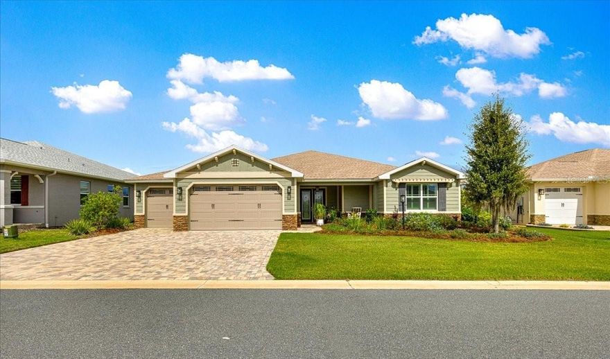 This Wellington model is better than new with many upgrades (See the upgrade sheet in the photos). 3 bedrooms, 3 bathrooms and a 3 car garage built in 2023. The sellers have added a birdcage with garden area on the back. Multiple beautiful plants that will beautify the back of your home and add to the privacy. Paver driveway and walkway. Beautiful neutral flooring throughout the home, pretty quartz counter tops and a chef's dream of a kitchen. Gas top range. Wall oven and microwave. Massive island with a farm sink. Kitchen is wide open to the living area. Large Florida room under heat and air. Primary bedroom with walk in closet. Roll in shower and a double sink, quartz counter top. Tower cabinet on sink for extra storage. Second primary bedroom with step in shower and walk in closet. 3rd bedroom nicely sized with a walk in closet. 3rd bath with a tub/shower combo. Flex space. Owner entrance with multiple cabinets for storage and a butlers pantry was added with shelving for a coffee bar and outlets including USB. Plantation blinds and so MUCH MORE! The new Azura clubhouse is coming soon and only steps from this home. Make your appointment to view today!