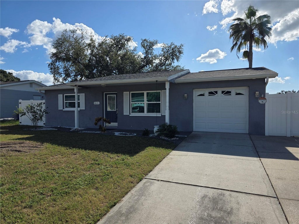 Photo of 8630 Fox Hollow Drive, Port Richey, FL 34668 (MLS # TB8560443)
