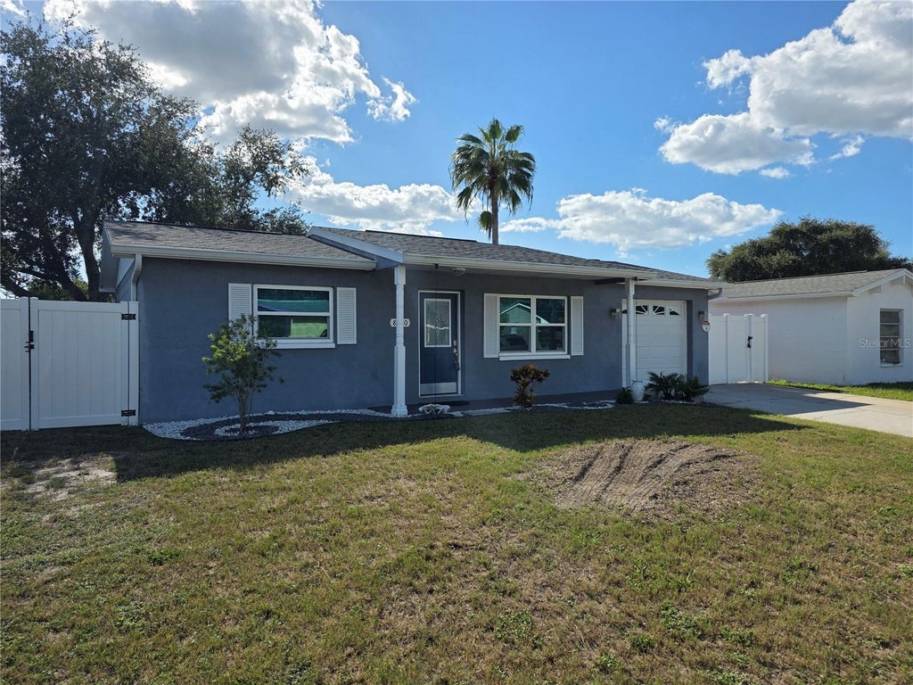 Photo of 8630 Fox Hollow Drive, Port Richey, FL 34668 (MLS # TB8560443)