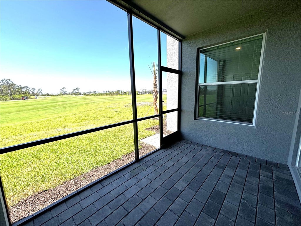 Photo of 17440 Opal Sand Drive #103, Venice, FL 34293 (MLS # C7529563)