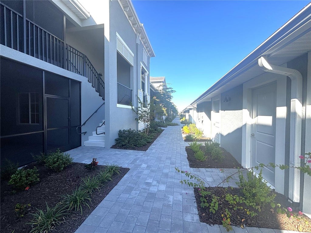 Photo of 17440 Opal Sand Drive #103, Venice, FL 34293 (MLS # C7529563)