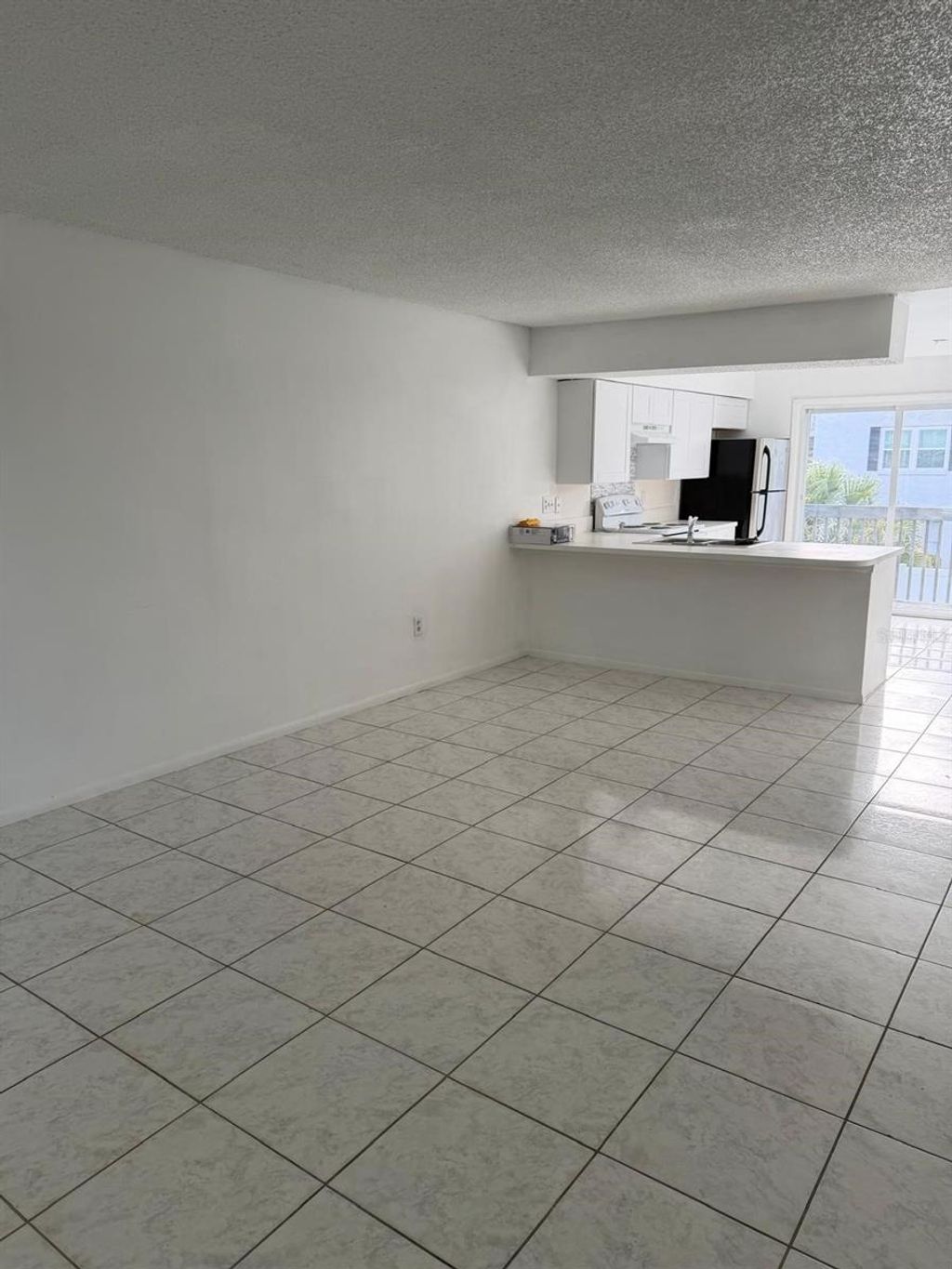 Photo of 1854 Caralee Boulevard #3, Orlando, FL 32822 (MLS # O6401906)