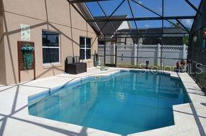 Photo of 836 Cassia Drive, Davenport, FL 33897 (MLS # O6418665)