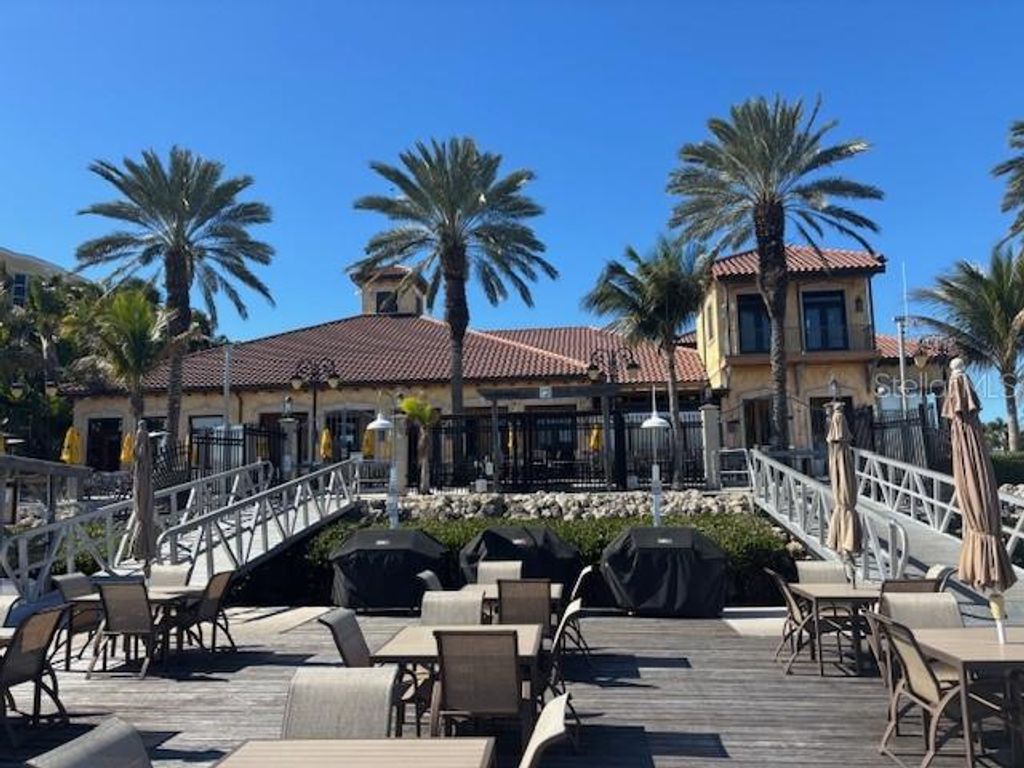 Photo of 102 Riviera Dunes Way #0, Palmetto, FL 34221 (MLS # O6376269)