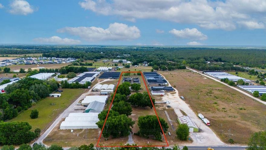 4.88 acres with 160 feet of W Kelly Park Road frontage being offered! Level and high & dry. Gated property with a 3 bedroom / 2 bath home that sits well off the road with 2664 sq ft gross area. This home is well maintained and a one-owner, custom build! Large detached garage with 3 doors. Additional metal building on property for storage. Water, Reclaim and Force Main sewer are available to the property per City of Apopka. 1.5 approx miles from the new Publix and the 429 ramps at Kelly Park Crossing! Great development opportunity. The 5.17 acre parcel to the east (reference MLS G5081874) and the 9.75 acre parcel to the east of that (reference MLS G5069404) are both also being offered for sale  separately. Opportunity to put 10 or 20 +/- acres together for your project. Purchase one, two or all 3