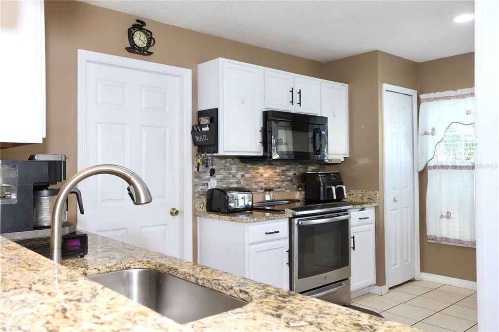 Photo of 16220 Coopers Hawk Avenue, Clermont, FL 34714 (MLS # R4909869)