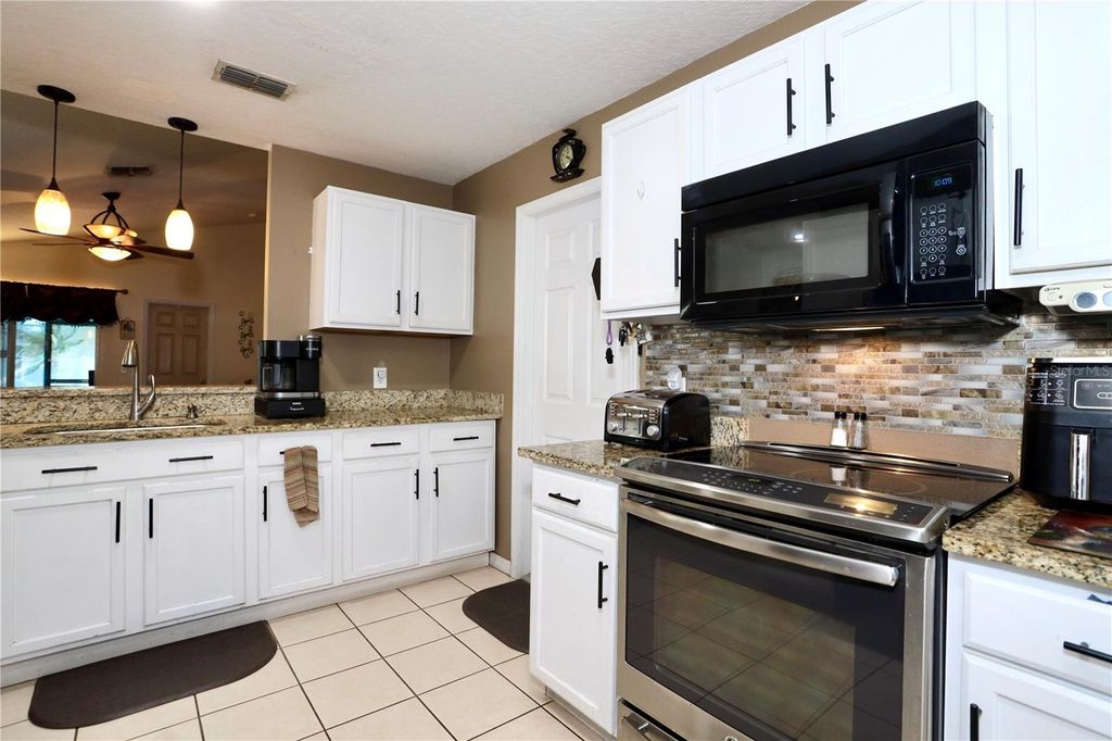 Photo of 16220 Coopers Hawk Avenue, Clermont, FL 34714 (MLS # R4909869)