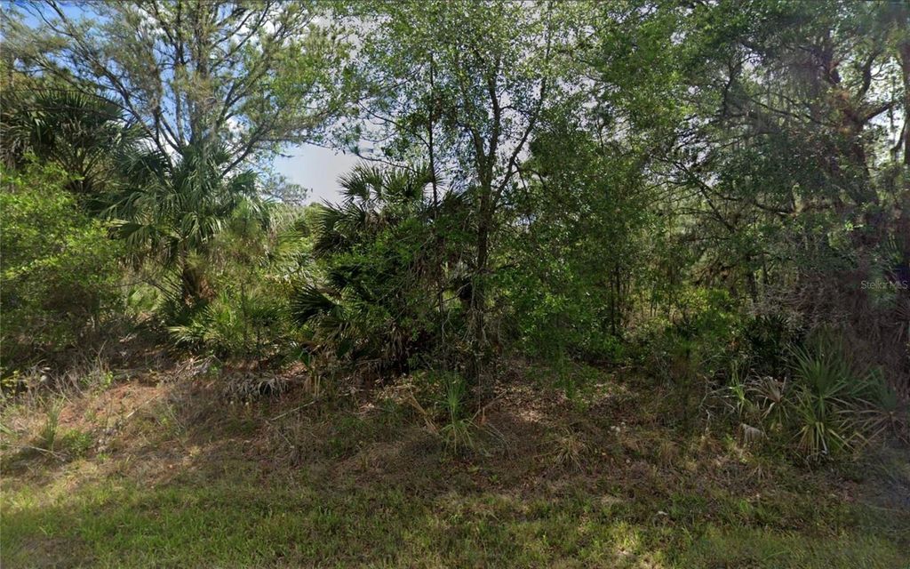 Photo of 1513 Candy Lane, Port Charlotte, FL 33953 (MLS # TB8460046)