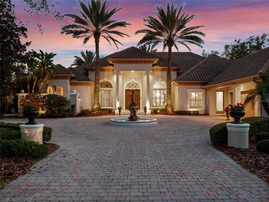 Discover the epitome of luxury in this renovated Dave Brewer home in Alaqua Lakes with views of water and golf. Boasting a thoughtfully designed split floor plan, this residence offers the ideal balance of privacy and open-concept living. The expansive primary suite is tucked away for ultimate tranquility, featuring a spa-like en suite and breathtaking views. Additional bedrooms are strategically placed in a three-way split plan ensuring comfort for family and guests. Upstairs, a spacious bonus room with a private balcony provides a versatile retreat, ideal for a media room, home office or playroom, while offering stunning views of the water and golf course. Designed for elegance and practicality, this home seamlessly blends indoor and outdoor living, with inviting spaces for entertaining and relaxation. Improvements include four new cooling/heating units, interior and exterior paint, Rinai tankless water heater and new Rheem water heater. Also added high-efficiency house water softener, whole home sound system with nine zones and an EV charger. Kitchen update includes new GE profile convection/microwave oven, touchless faucet, Blanco Silgrant kitchen sink, quartz counters and new backsplash. Pool renovation included new PebbleTec surface, new tile, and new sun shelf along with travertine decking on entire back surface. There was also a new pool filter and pool pump, new saltwater system, and two Pentair 14 color-changing lights to pool and spa. Also added two deck jets and AquaLink smart device along with new outdoor motorized screens. Set within the prestigious Alaqua Lakes community, enjoy access to premier amenities, championship golf, and a serene, gated environment. Move-in ready and designed to impress, this is the dream home you’ve been searching for!
