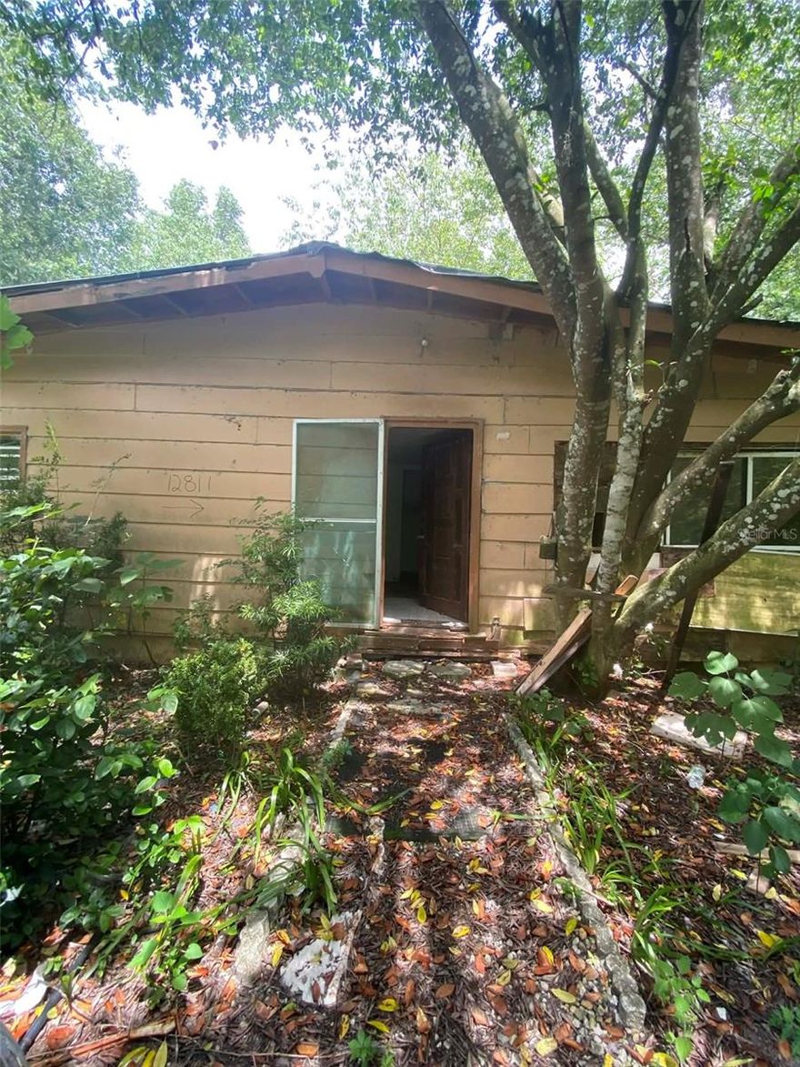 Quad property located in Belleview! The property includes multiple existing structures, including a mobile home, and all improvements will require significant repairs or complete renovation. This is a true handyman or investor special, ideal for buyers looking to renovate, redevelop, or repurpose the property. Sold as-is. Bring your vision and contractor. The land is valued at $120,000! A member/manager of the owning LLC is a licensed real estate agent.