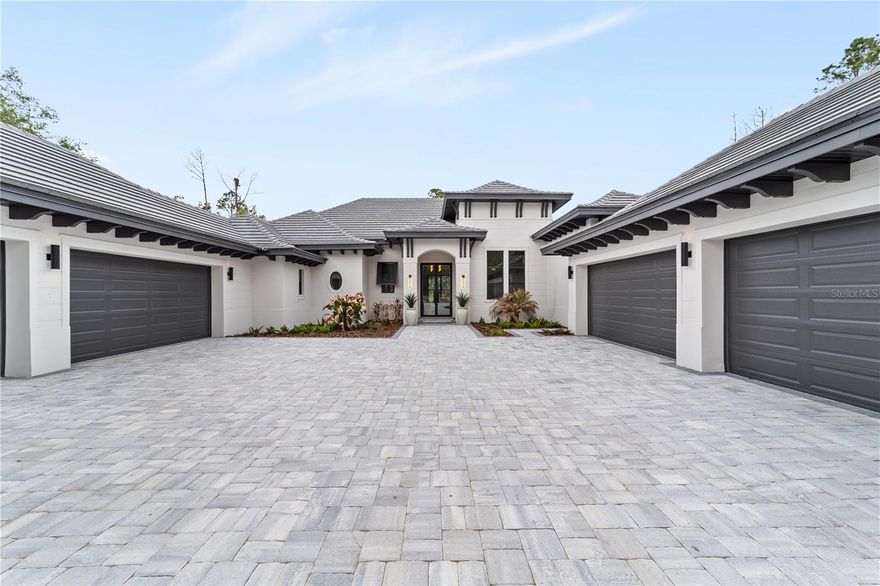 Discover the Savannah, a brand-new single-story residence by Davila Homes, nearing completion in the private gated community of Bella Collina. Designed with an open, flowing layout, this home blends timeless elegance with modern comfort.

The expansive great room connects seamlessly to the chef’s kitchen and dining areas, highlighted by a dramatic tray ceiling in the living room and a drop-down soffit with beams that define the kitchen space with architectural character. The private owner’s suite showcases dual walk-in closets and a spa-inspired bath, both accented with elegant tray ceiling details. Secondary bedrooms each include en-suite baths and generous storage, creating a thoughtful layout for family and guests.

Step outside to a private backyard oasis where a tray-ceiling lanai with wood beams frames the sparkling pool and spa. Additional features include a custom fire pit, low-maintenance artificial turf, and Myra stepping stones that connect the entertaining spaces with beauty and ease.

Set within Bella Collina’s iconic Tuscan-inspired hillsides, residents enjoy world-class amenities including the Sir Nick Faldo–designed championship golf course, resort-style pool, fitness center, tennis, pickleball, dining, and a 75,000-square-foot clubhouse overlooking Lake Siena.

With designer finishes already selected and construction nearing completion, the Savannah model is nearly ready to welcome you home. Schedule your private tour today and experience luxury living in Bella Collina.