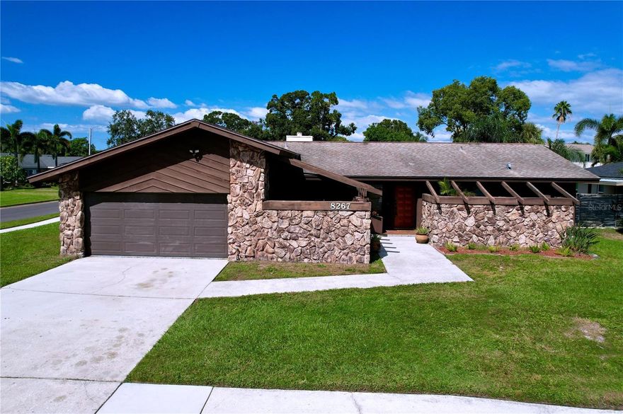 COMPLETELY REMODELED POOL HOME in Seminole offers 3 bedrooms, 2 bathrooms, and 2,478 square feet of living space sitting on a spacious corner-acre lot. ALL NEW LVP FLOORING, PAINT, KITCHEN & BATH with a functional open layout and a cozy fireplace, generous living areas, and a sunny Florida room! Located in the Bardmoor South community, this ranch-style home has new QUARTZ COUNTERTOPS, all new cabinets and a 2 car garage. Split-bedroom floor plan and two large living areas, including a fully enclosed Florida room. Outside, enjoy your own private pool and fenced backyard, perfect for entertaining or relaxing in Florida’s sunshine. Plus, two paved courtyards with privacy to extend the outdoor experience. Plenty of storage inside and out. Conveniently located near Bardmoor Golf & Tennis Club, schools, shopping, dining, medical facilities, and Gulf beaches.