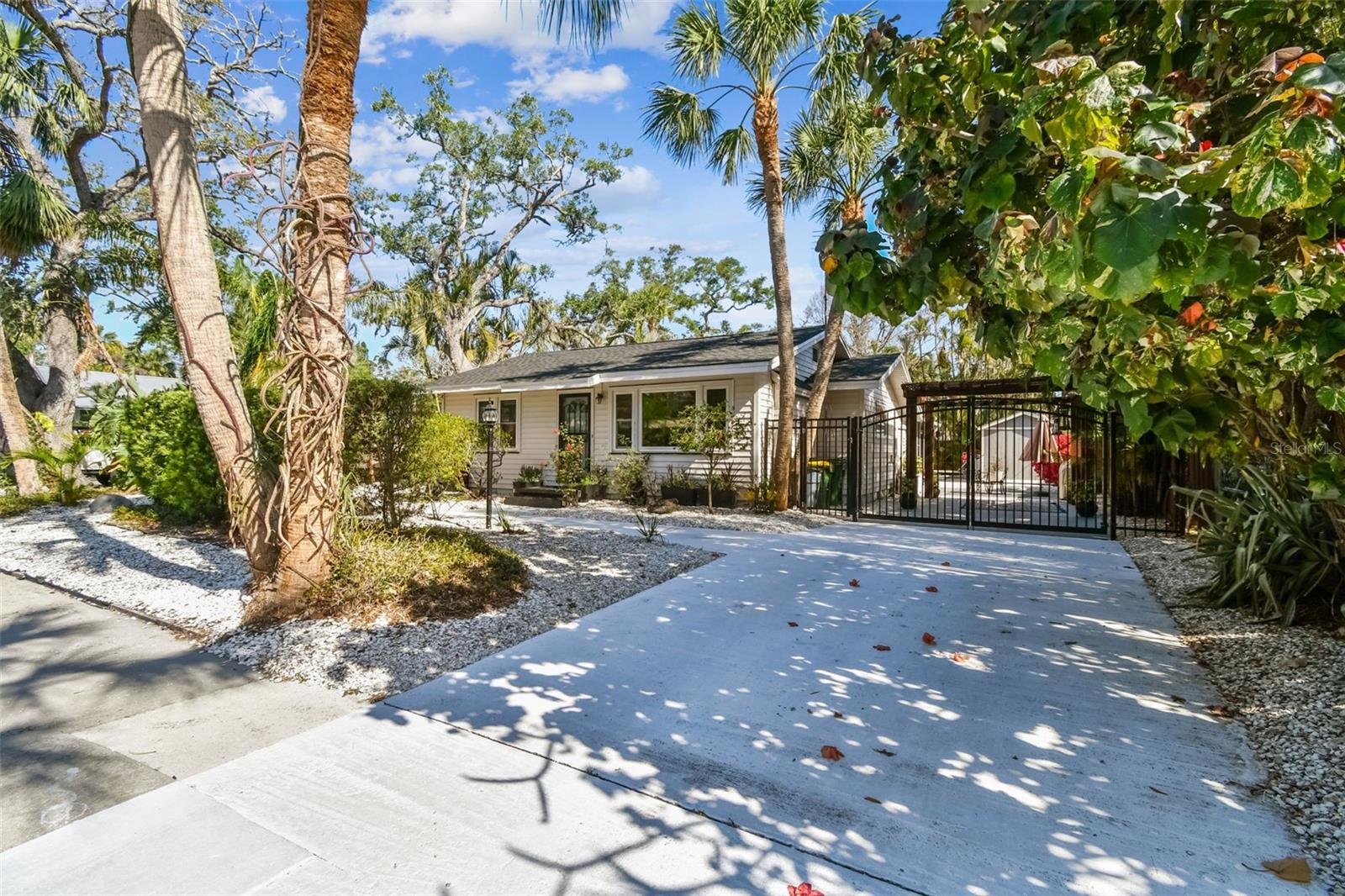 Rare opportunity for snowbirds or investors with pool oasis. Discover your potential at 913 Tennessee Ave., which sits bayside in Sarasota, an excellent opportunity for investors or buyers seeking property with flexibility and rental income history. This home has a track record of rentals, making it ideal for continued use as an investment property or a creative renovation project. Set on a generous lot, the property features a beautiful private saltwater pool surrounded by lush greenery, offering a Florida outdoor living experience. Whether you’re looking to enjoy the structure or hold as a long-term investment, this home offers multiple paths to value. In an established neighborhood close to beaches, dining, shopping and all Sarasota has to offer, this property is full of potential. Hurricane Windows, plumbing and new roof were added in 2021. Don’t miss your chance to make this versatile property your next success story and schedule a showing today!