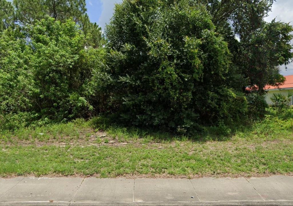 Photo of 672 SW Port St Lucie Blvd, St Lucie West, FL 34953 (MLS # A4683075)